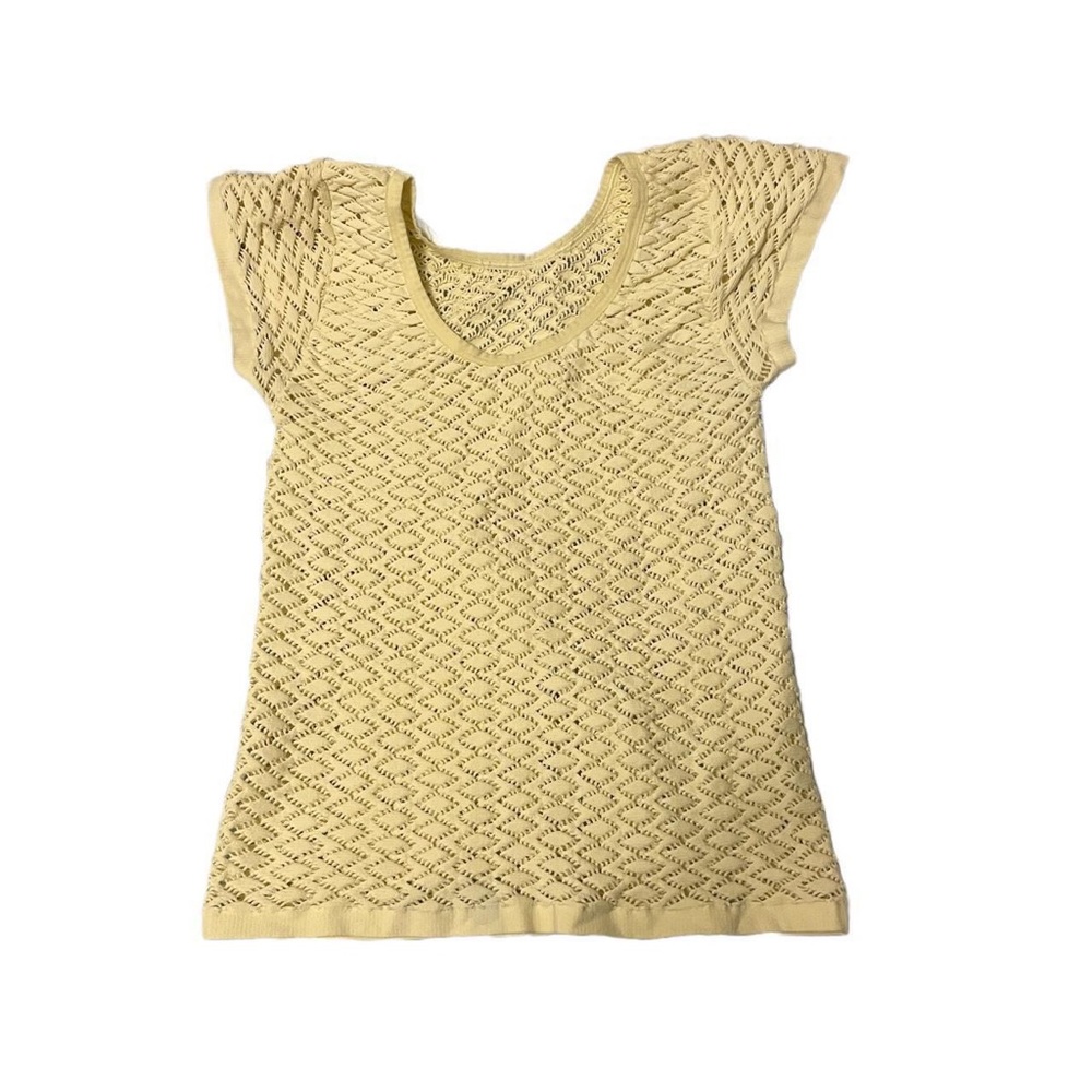 an interesting yellow shirt ; not branded